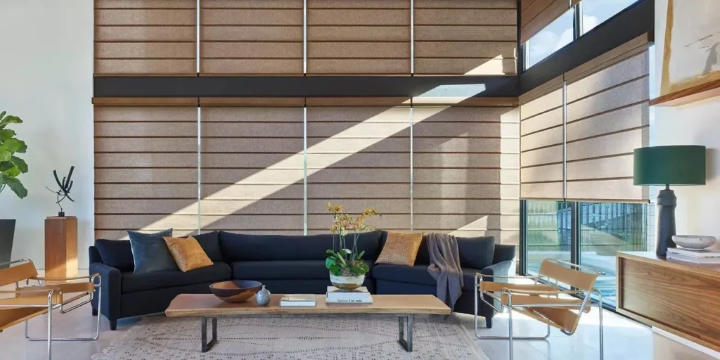 hunterdouglas-alustra-architectural-rollershades-brown-livingroom-fashioninteriors