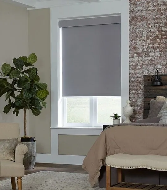 lutron sivoia qs triathlon rollershades hero banner bedroom gray blackout closeup fashioninteriors2 1920w
