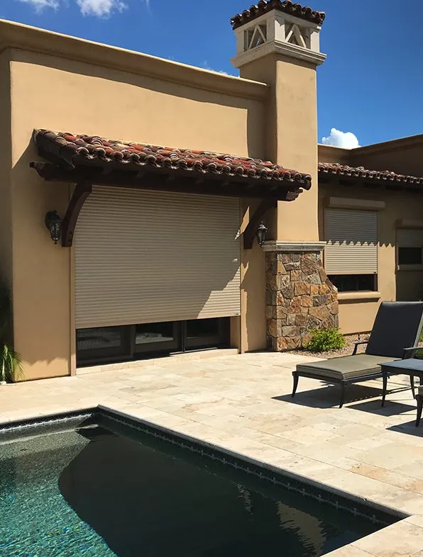 outdoor rolling shutters exterior view pool area lounge chair tucson 2019 1920w