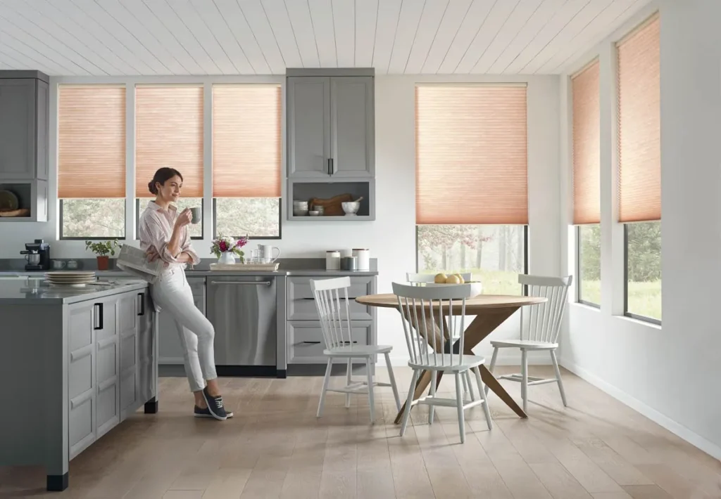 Applause Honeycomb Cellular Shades Gray Modern Kitchen Beige White Gray Amber Pink After Model Standing Hd 2