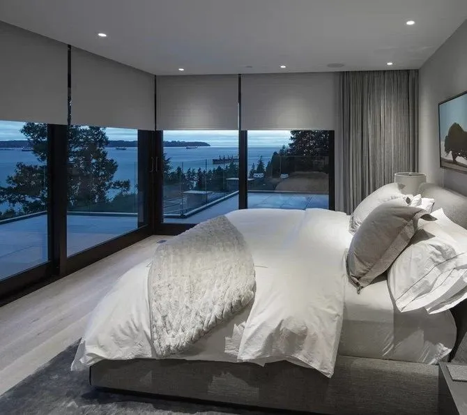 lutron sivoia qs rollershade fashioninteriors blackout gray bedroom beachfront home 1920w
