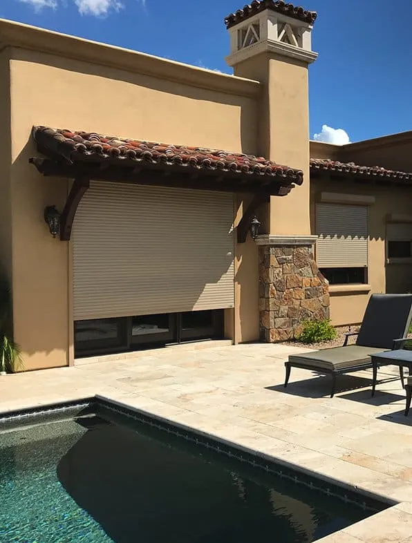 outdoor rolling shutters exterior view pool area lounge chair tucson fashioninteriors 2019 md 1920w