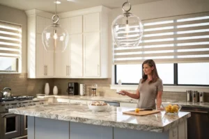 Somfy Motorized Zebra Banded Shades Woman Kitchen Remotecontrol Fashioninteriors 2025